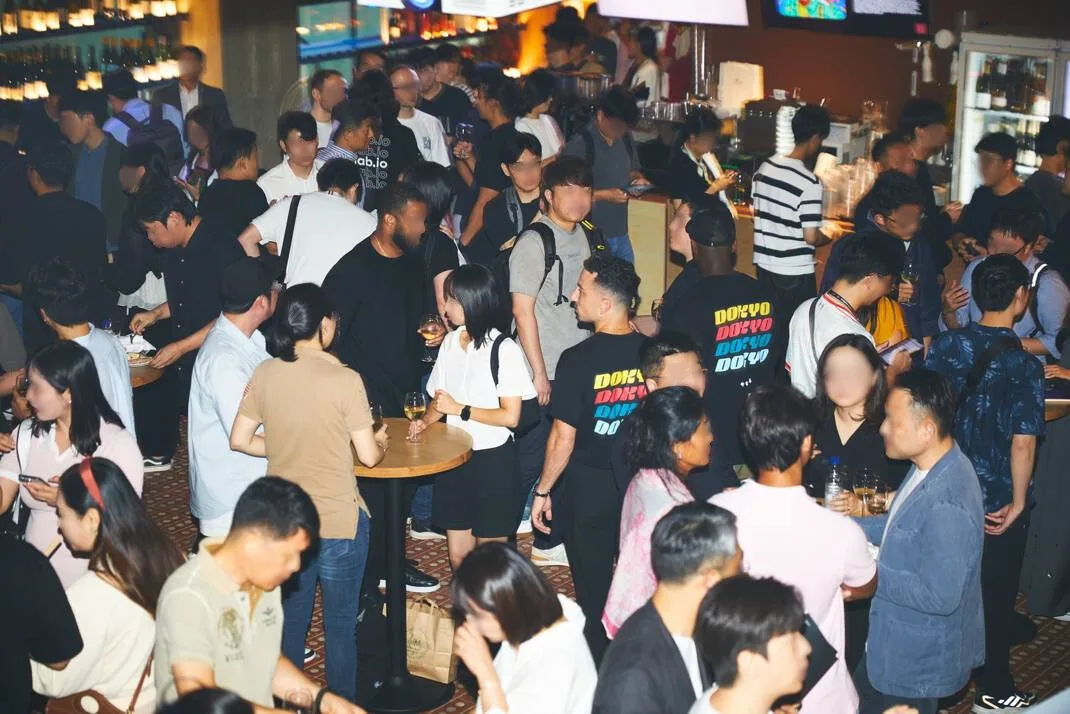Korea Dokyo event crowd with merch in the room